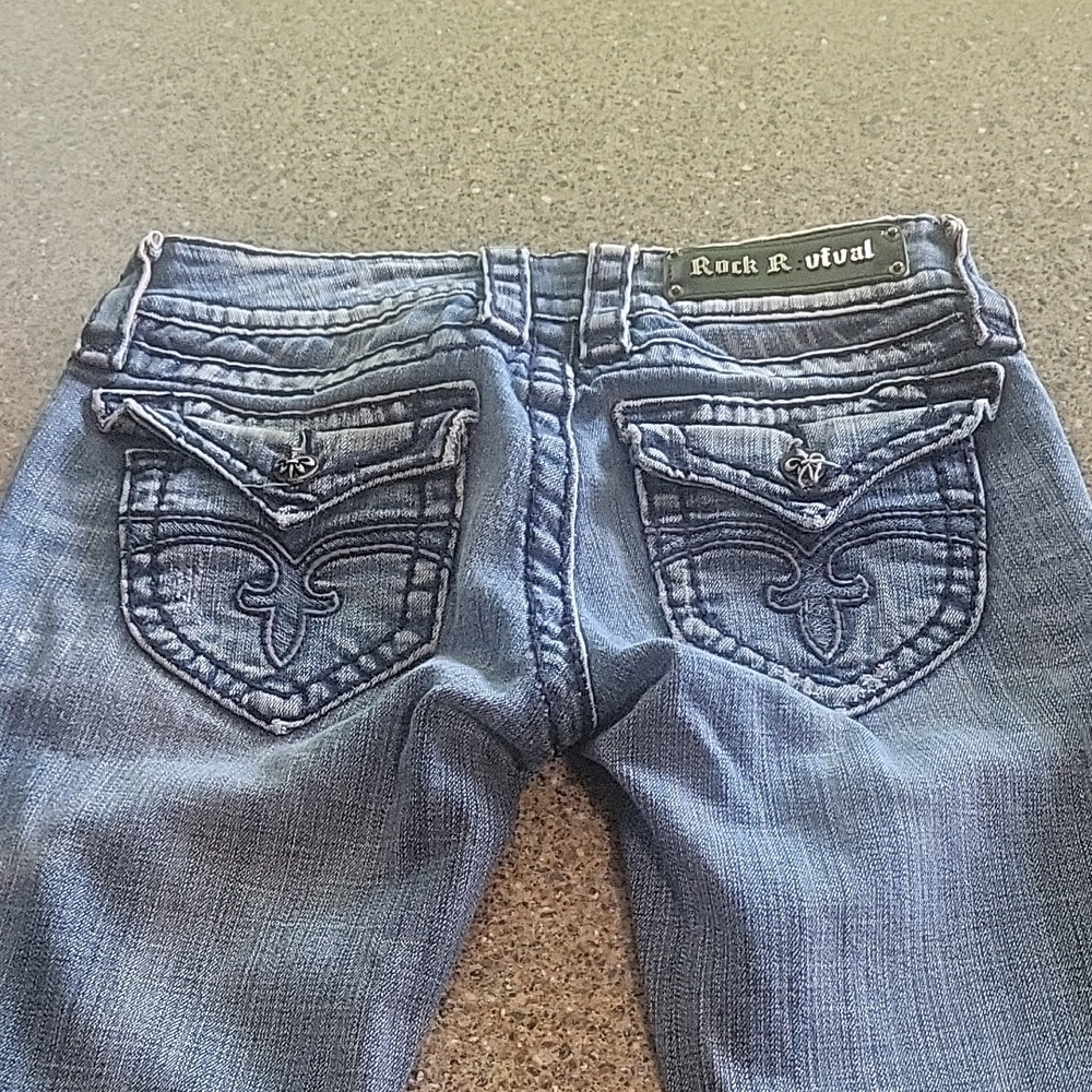 Rock Revival Blue Jeans with Distinctive Stitching